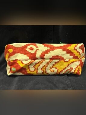 Red and Yellow Patterned accessory bag.